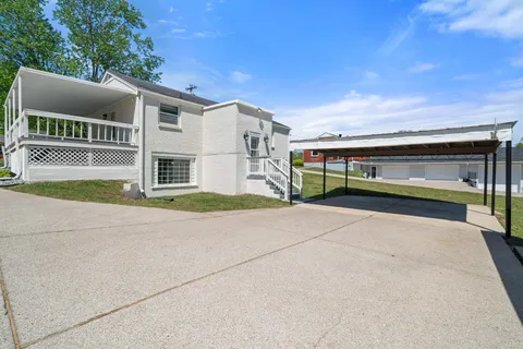 a view of a building with a yard