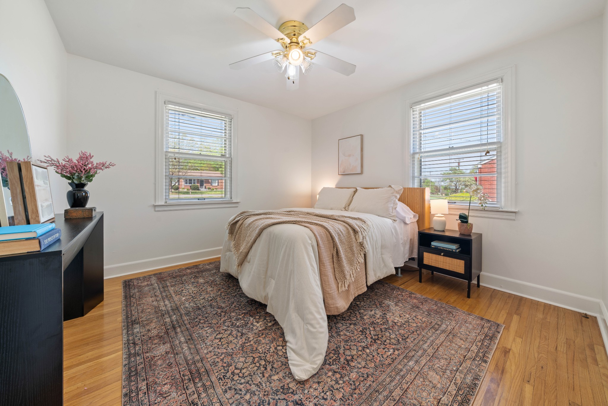 3926 East Ridge Drive Nashville, TN 37211 - Photo 8 of 38 a bedroom with a bed and a chandelier