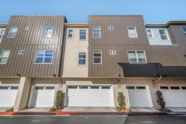 a view of a house with a barbeque