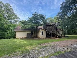 220 Ridgecrest Road Southeast Mableton, GA 30126 - Photo 10 of 12 a house that has a backyard