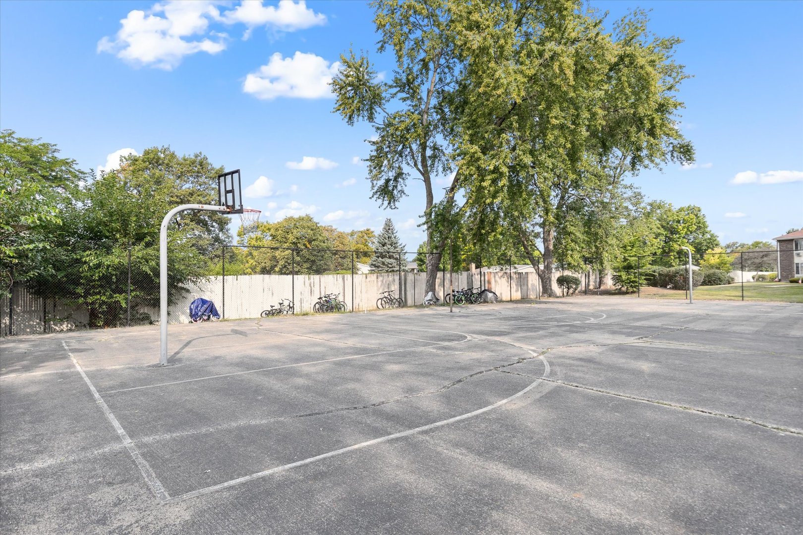 2400 Light Road, Unit 111 Oswego, IL 60543 - Photo 22 of 27 a view of a house with a yard and tree s