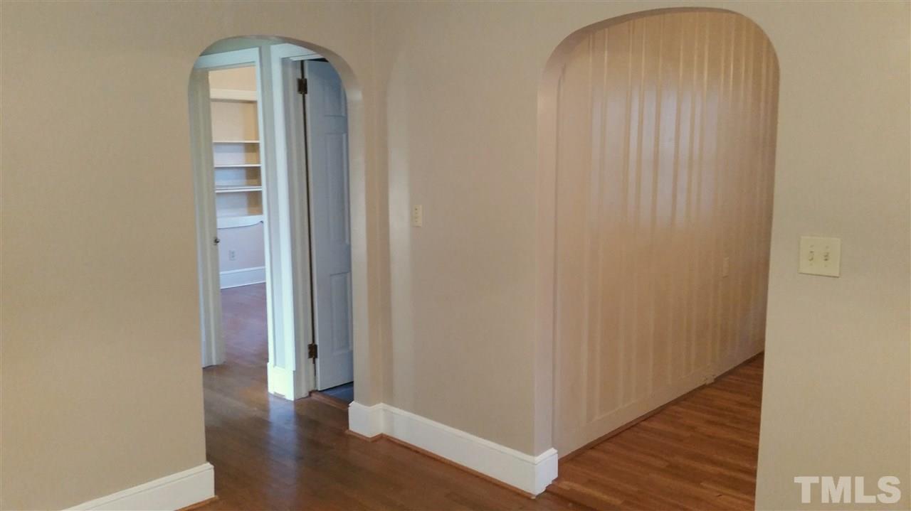 375 Burlington Road Roxboro, NC 27573 - Photo 7 of 11 a view of a hallway with wooden floor