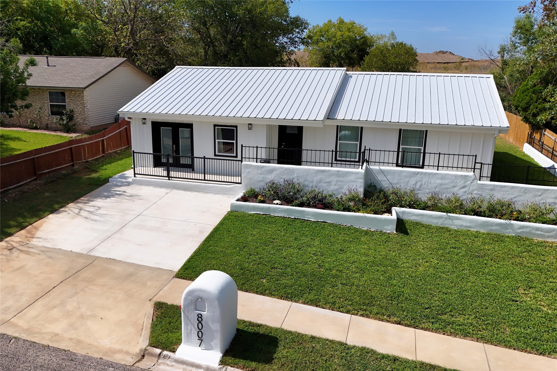 8007 Colony Loop Drive Austin, TX 78724 - Photo 39 of 40 Fresh curb appeal, wide driveway, and a spacious homesite that stands out immediately.