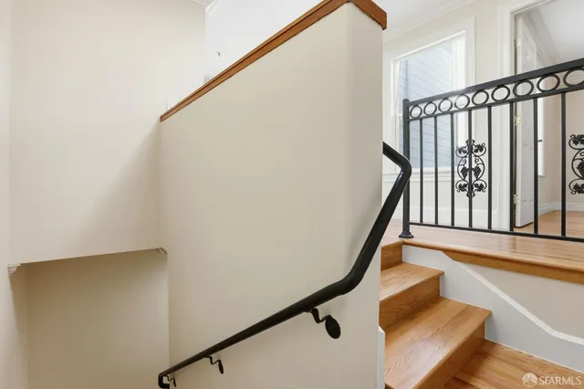 front view of a house with a small yard