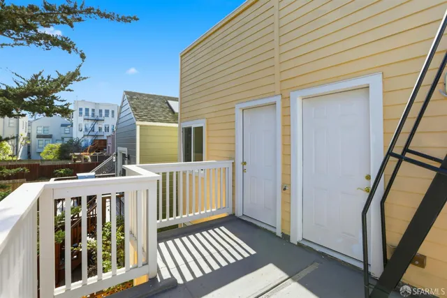 a view of deck and backyard