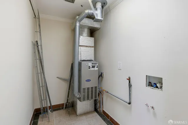 a bathroom with a granite countertop bathtub shower sink mirror and toilet