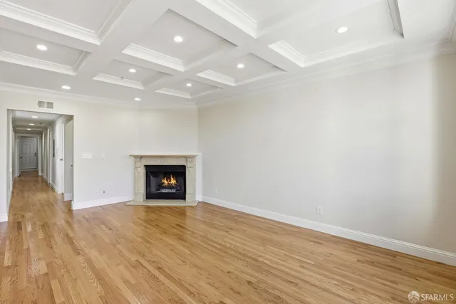 a kitchen with stainless steel appliances granite countertop a stove a refrigerator and a microwave