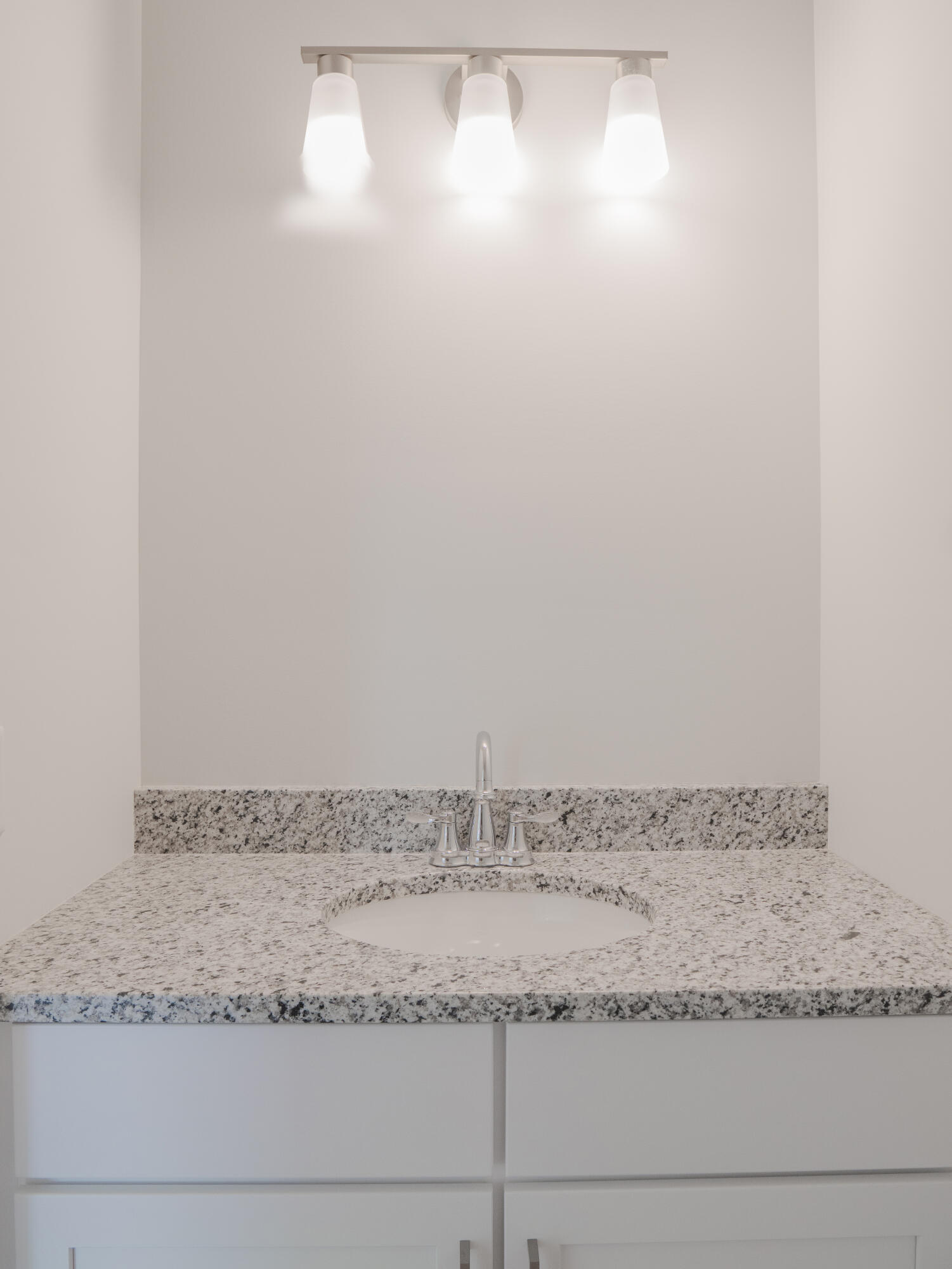 11659 Park Street Crown Point, IN 46307 - Photo 4 of 24 a view of granite countertop and white cabinets