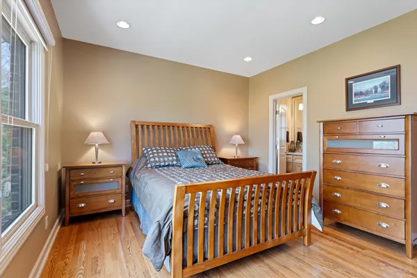 a bedroom with a bed and a cabinets