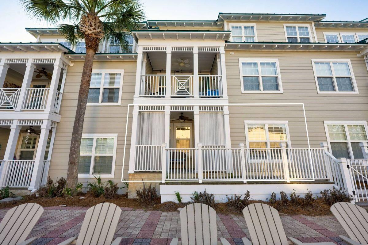 124 Village Boulevard, Unit 813 Santa Rosa Beach, FL 32459 - Photo 14 of 19 a front view of a house with a yard