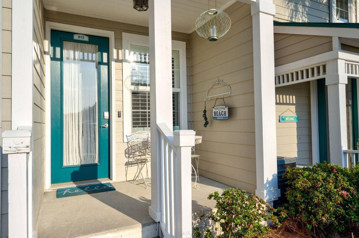 124 Village Boulevard, Unit 813 Santa Rosa Beach, FL 32459 - Photo 16 of 19 a front view of a house with a porch