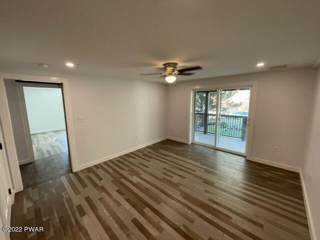 2 Hudson Street Hawley, PA 18428 - Photo 26 of 43 an empty room with wooden floor and fan