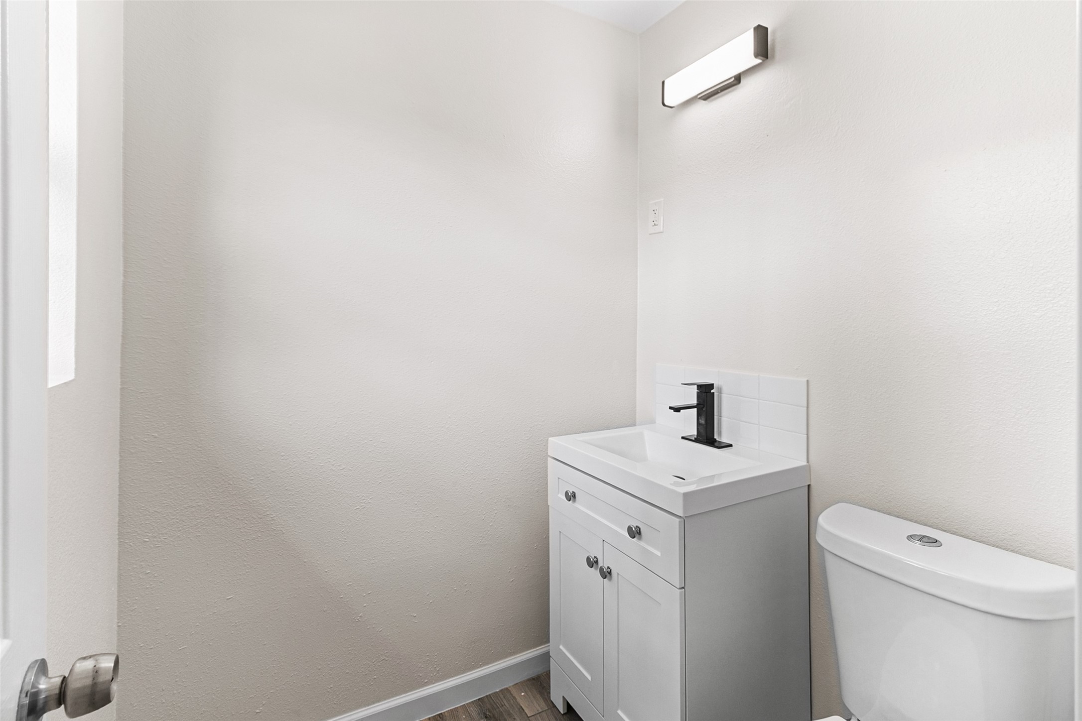 16715 Waycreek Road Houston, TX 77068 - Photo 13 of 41 a bathroom with a sink a toilet and a mirror