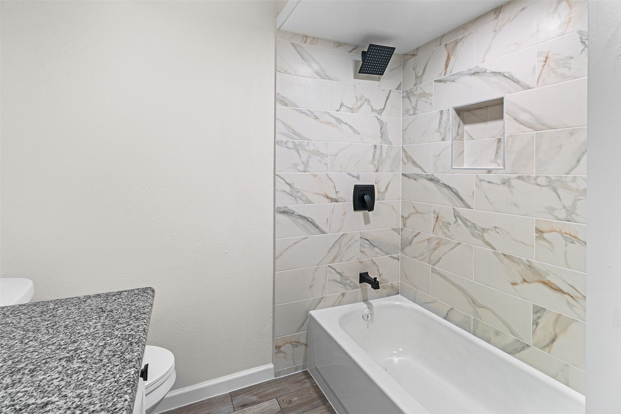 16715 Waycreek Road Houston, TX 77068 - Photo 16 of 41 a bathroom with a bathtub and shower