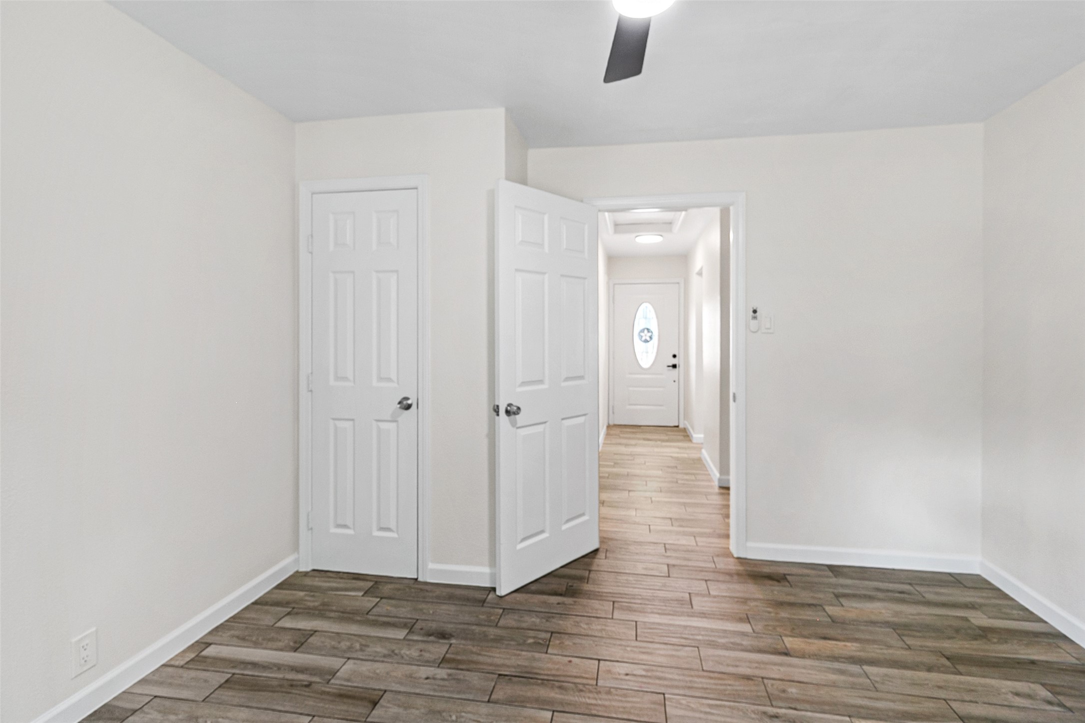 16715 Waycreek Road Houston, TX 77068 - Photo 18 of 41 a view of a hallway with wooden floor