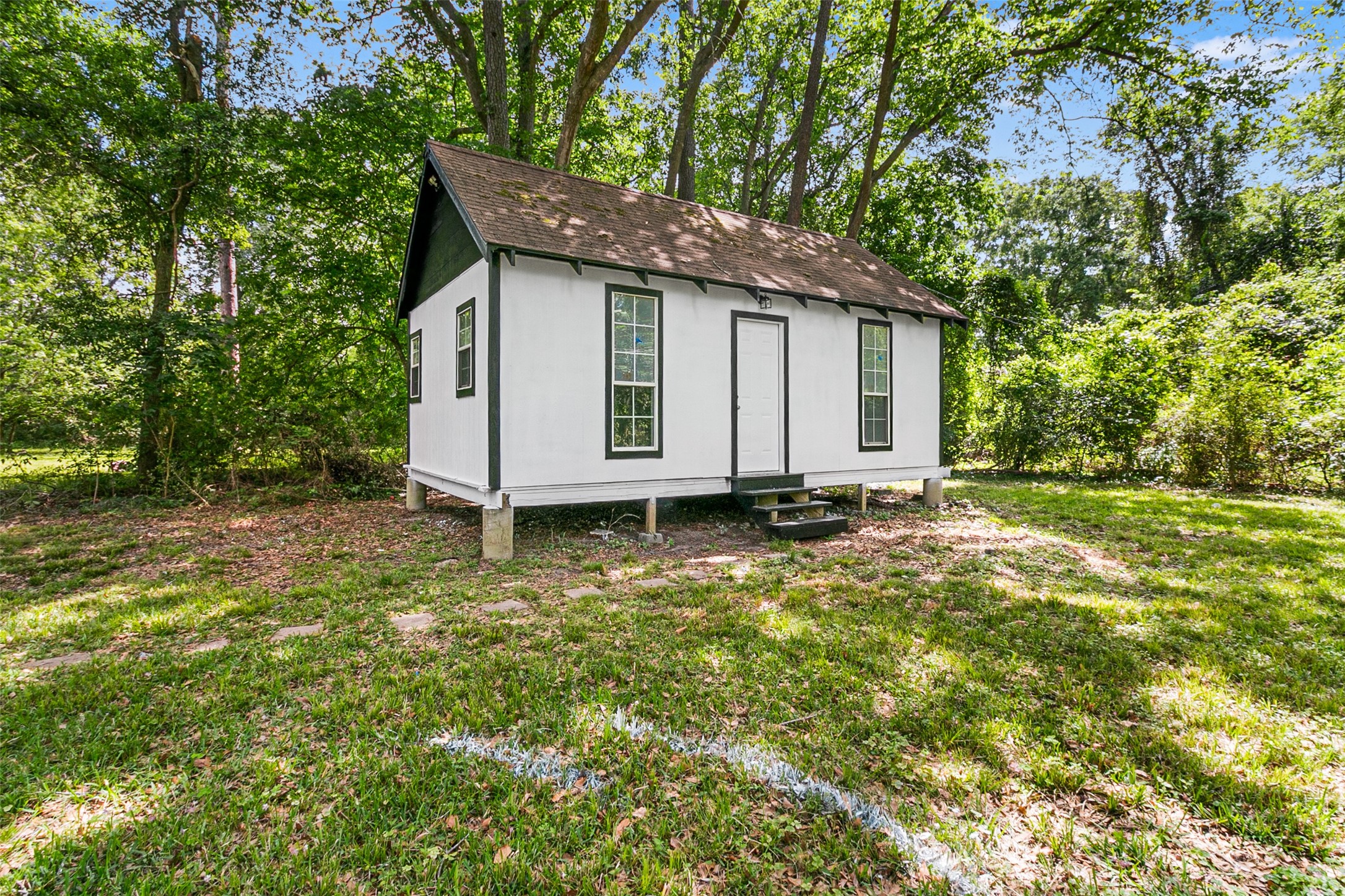 16715 Waycreek Road Houston, TX 77068 - Photo 25 of 41 a view of a house with backyard and garden