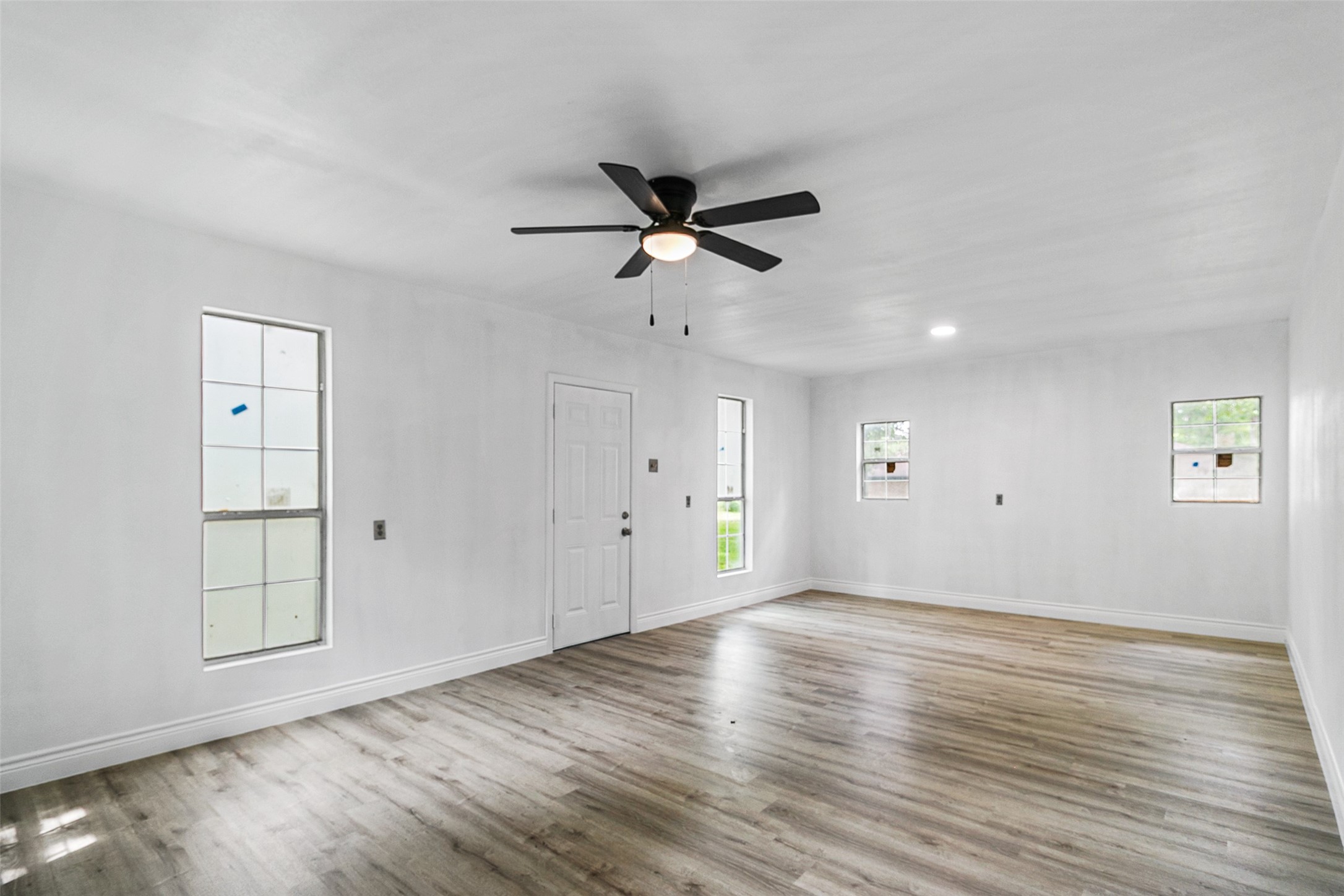 16715 Waycreek Road Houston, TX 77068 - Photo 27 of 41 wooden floor in an empty room with a window