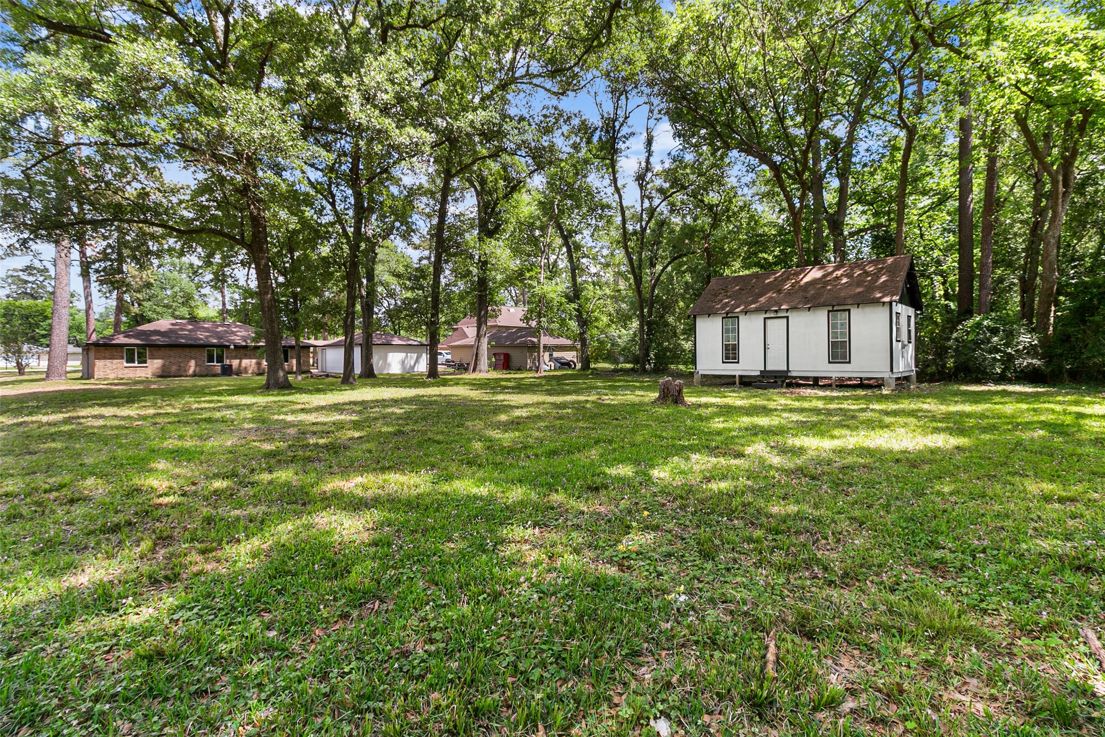 16715 Waycreek Road Houston, TX 77068 - Photo 32 of 41 a view of a house with a big yard