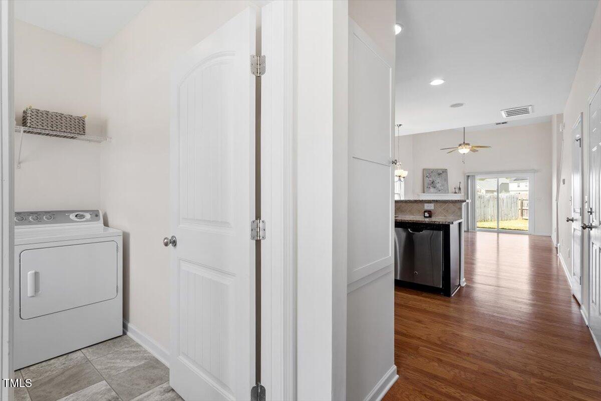 632 Hunters Ridge Drive Fuquay-Varina, NC 27526 - Photo 6 of 28 a view of a kitchen cabinets and wooden floor
