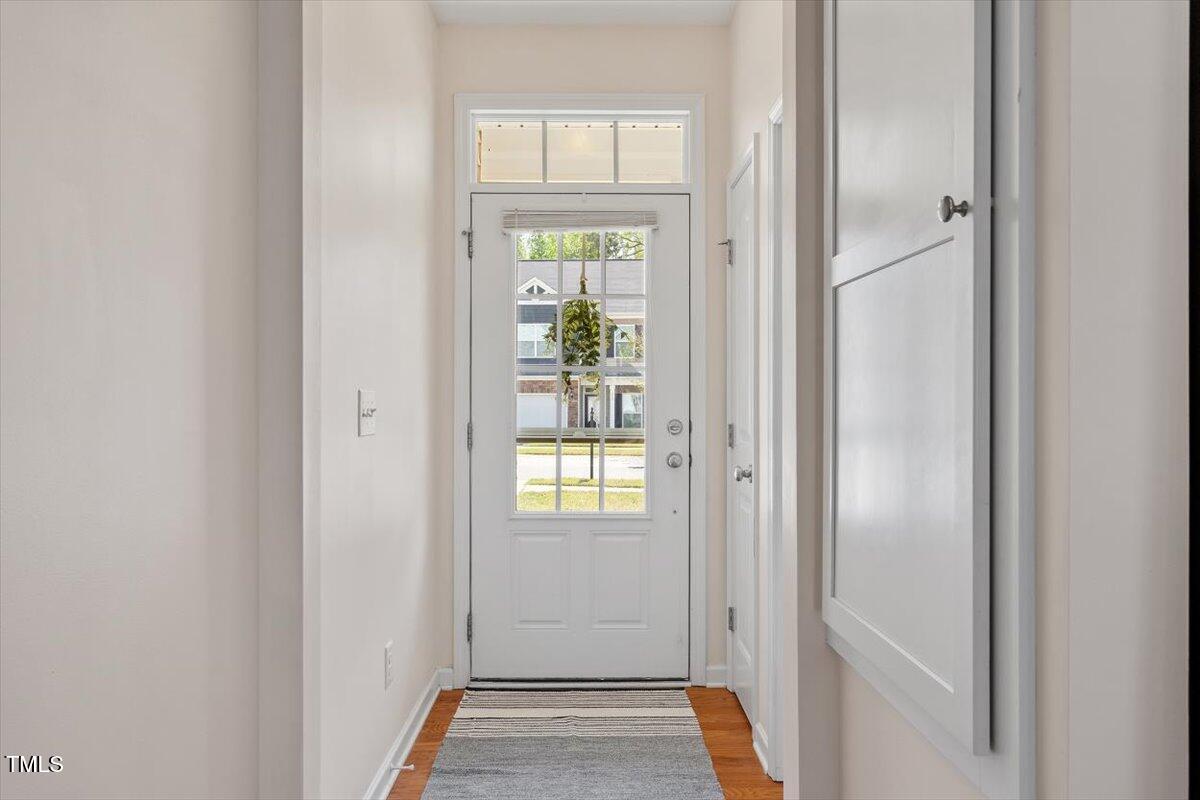 632 Hunters Ridge Drive Fuquay-Varina, NC 27526 - Photo 8 of 28 a view of an entryway with wooden floor