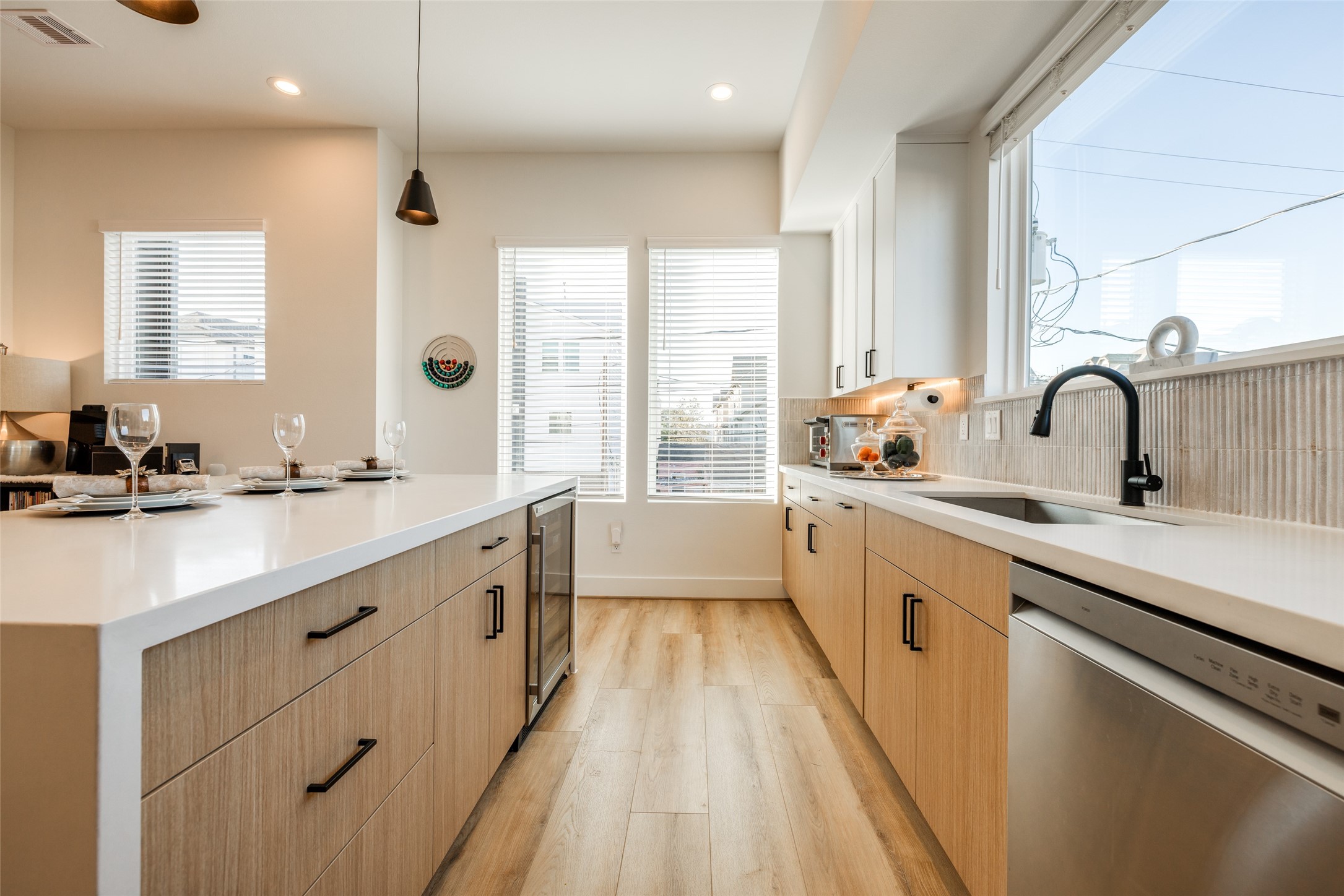 412 North Nagle Street Houston, TX 77003 - Photo 16 of 40 a large white kitchen with a large window