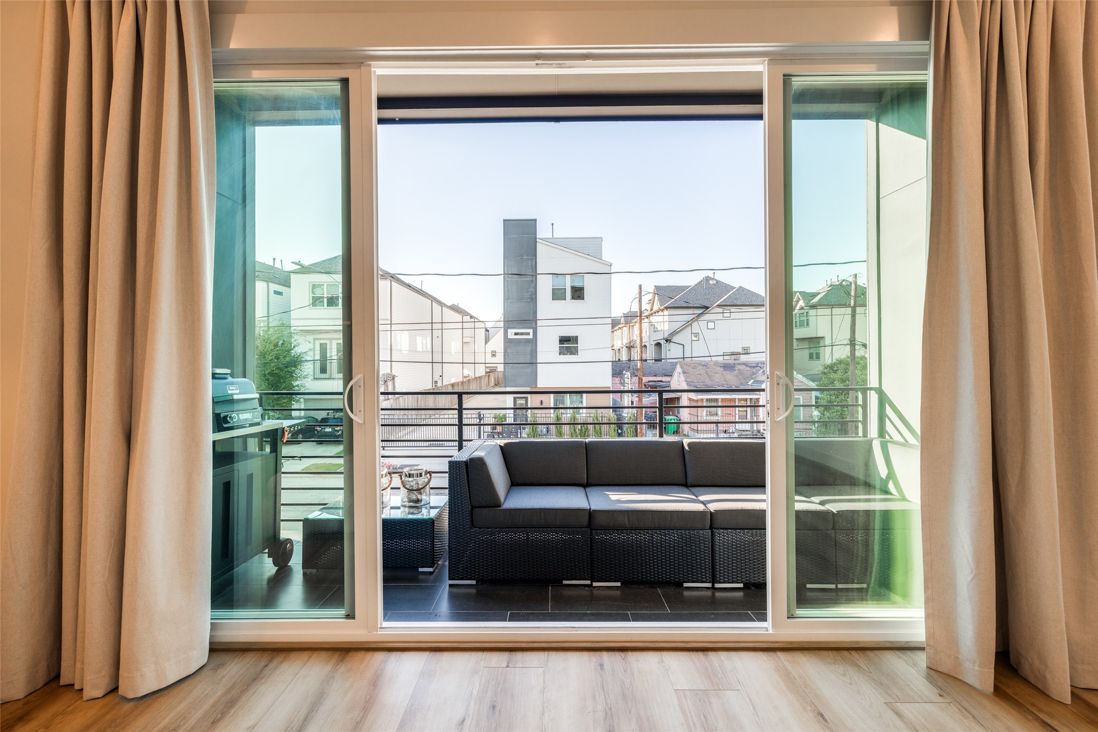 412 North Nagle Street Houston, TX 77003 - Photo 22 of 40 a living room with a large window and a table