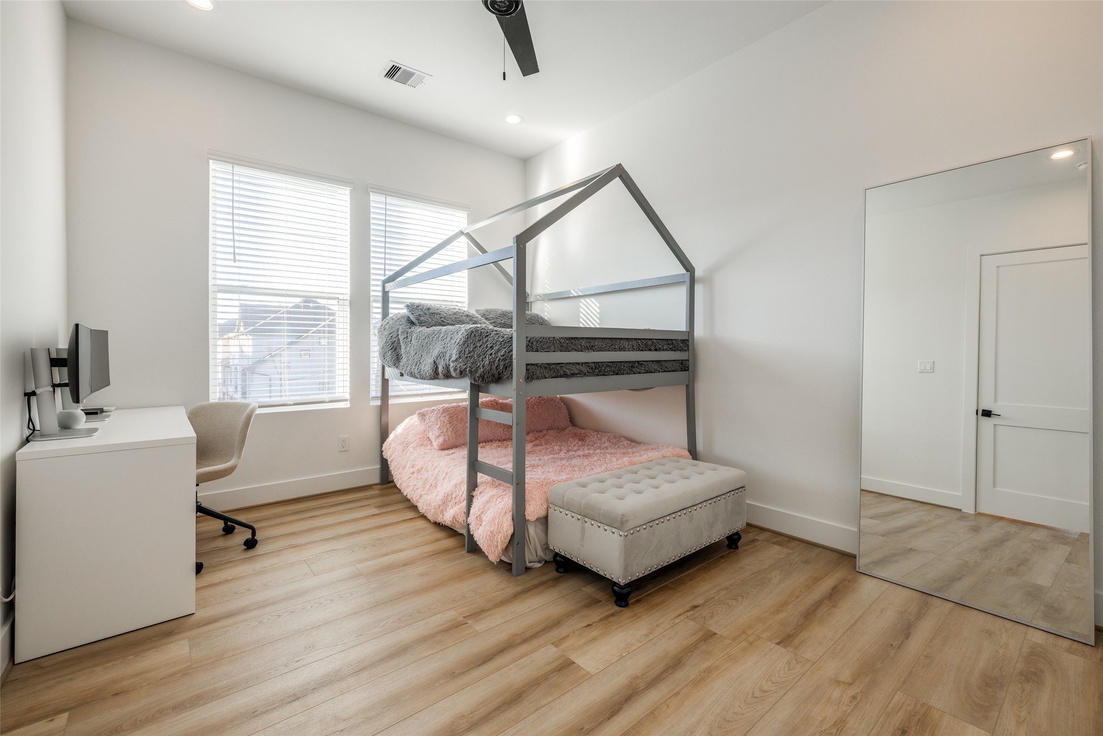 412 North Nagle Street Houston, TX 77003 - Photo 27 of 40 a bedroom with furniture and a large window