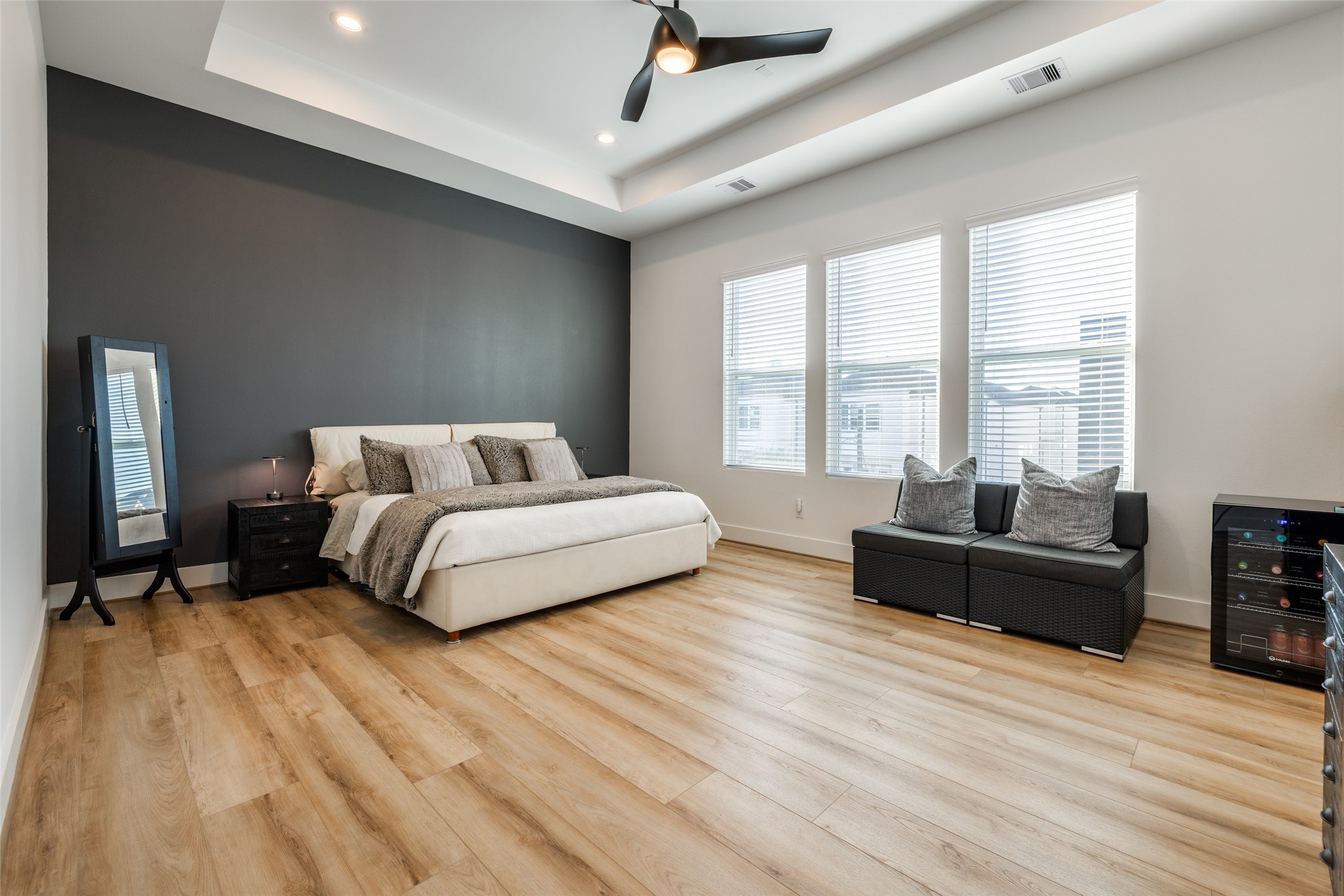 412 North Nagle Street Houston, TX 77003 - Photo 29 of 40 a bedroom with a bed and wooden floor