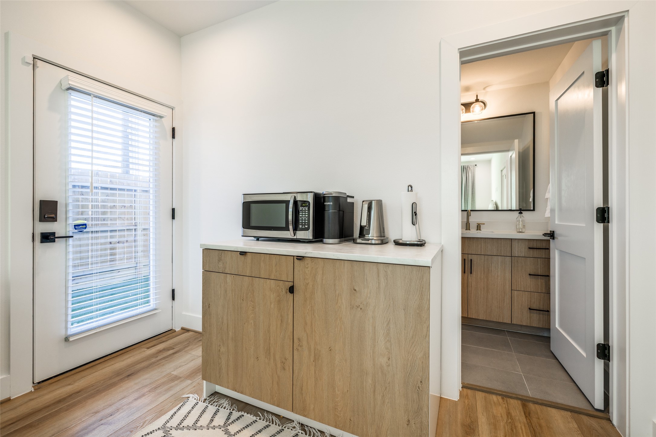 412 North Nagle Street Houston, TX 77003 - Photo 6 of 40 a kitchen with a refrigerator and cabinets