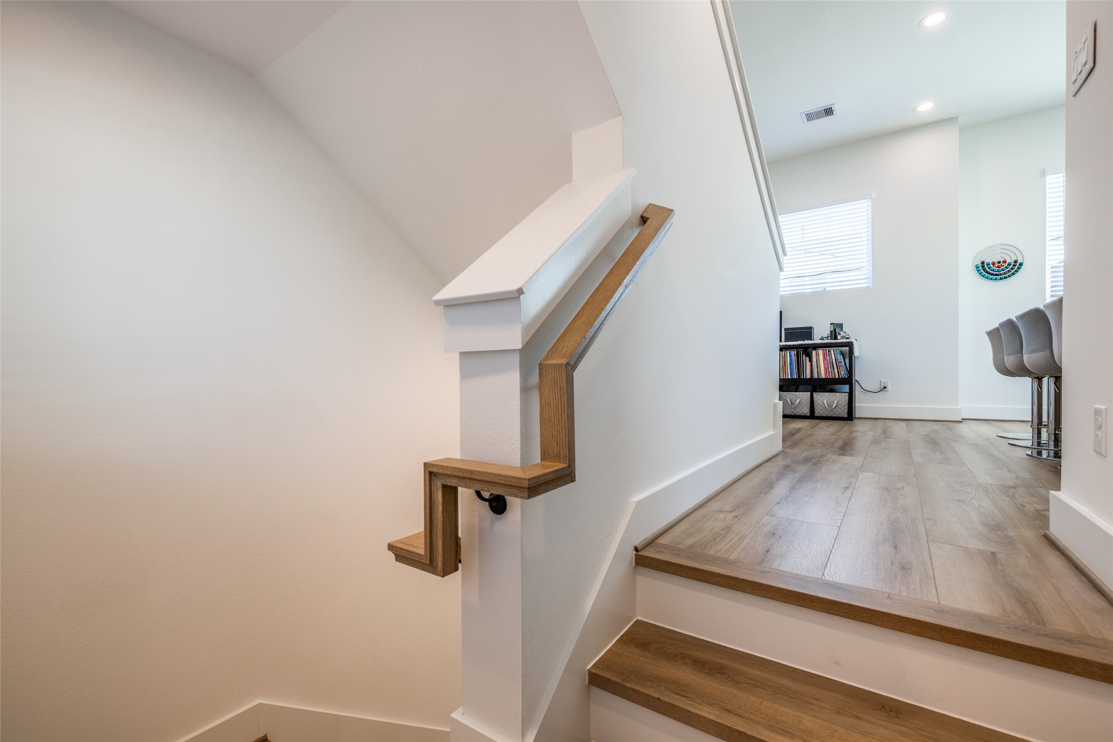412 North Nagle Street Houston, TX 77003 - Photo 10 of 40 a view of a hallway view with wooden floor and staircase