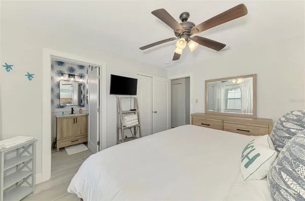 a bathroom with a sink and vanity