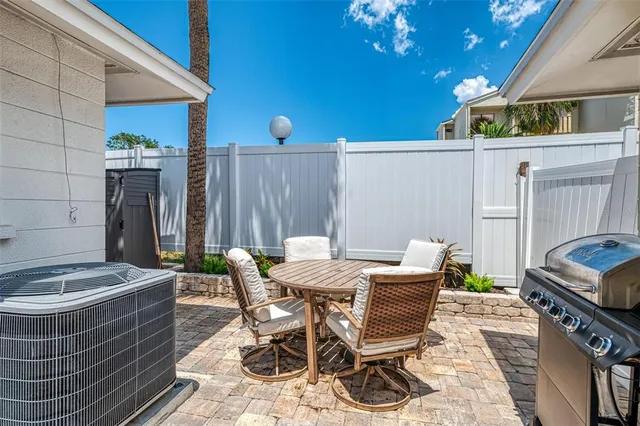 a view of a balcony with wooden floor and city view