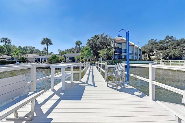 a view of a car is parked in front of a building