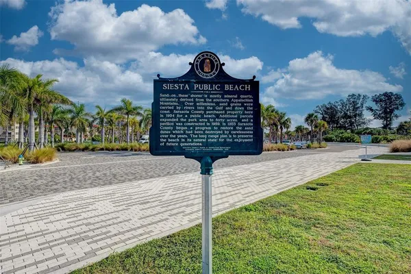 a view of a road with an ocean view