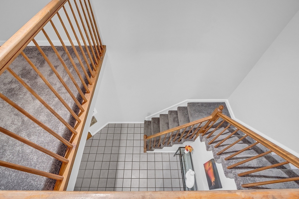 200 Market Street, Unit 117 Lowell, MA 01852 - Photo 12 of 37 a view of staircase and utility room