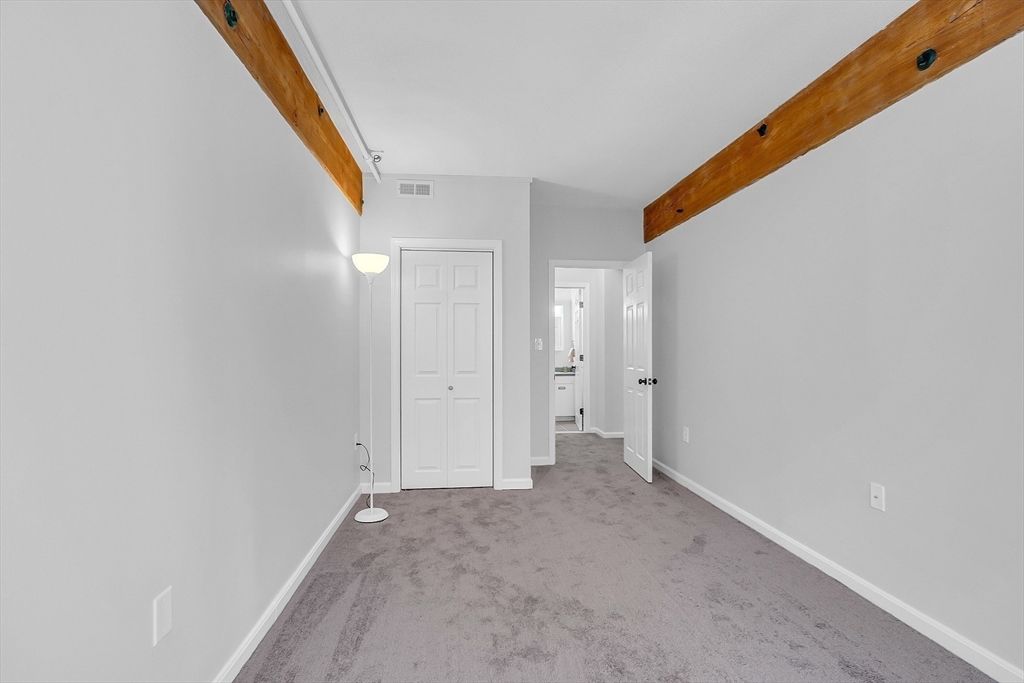 200 Market Street, Unit 117 Lowell, MA 01852 - Photo 17 of 37 a view of an empty room