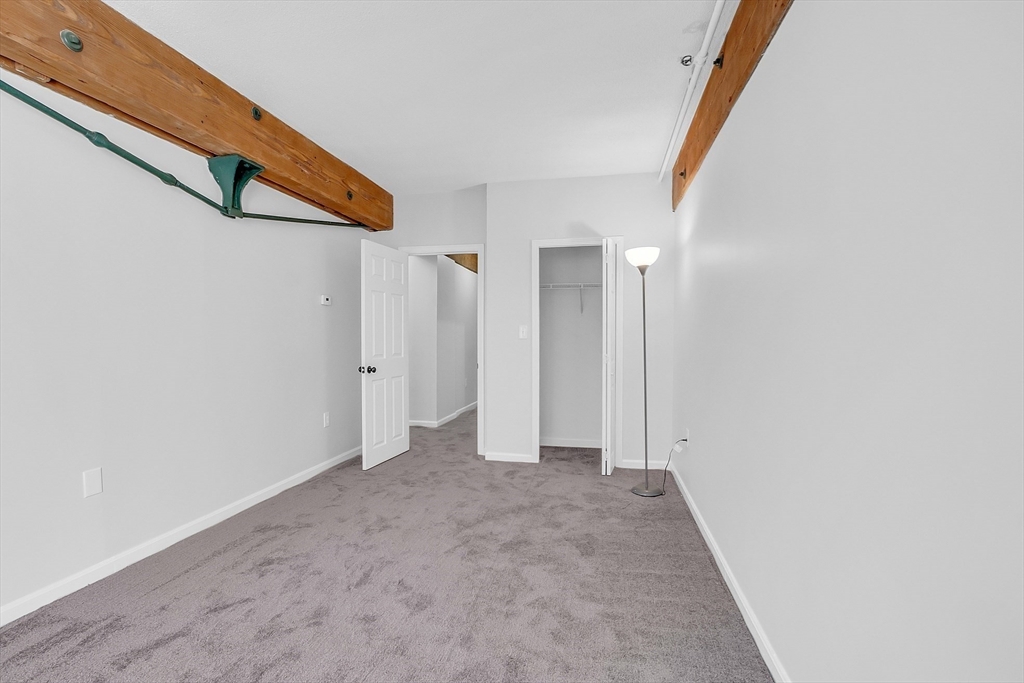 200 Market Street, Unit 117 Lowell, MA 01852 - Photo 21 of 37 a view of an empty room
