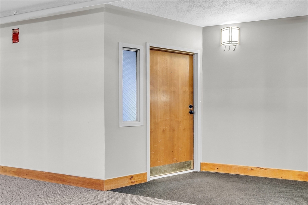200 Market Street, Unit 117 Lowell, MA 01852 - Photo 32 of 37 a view of an empty room
