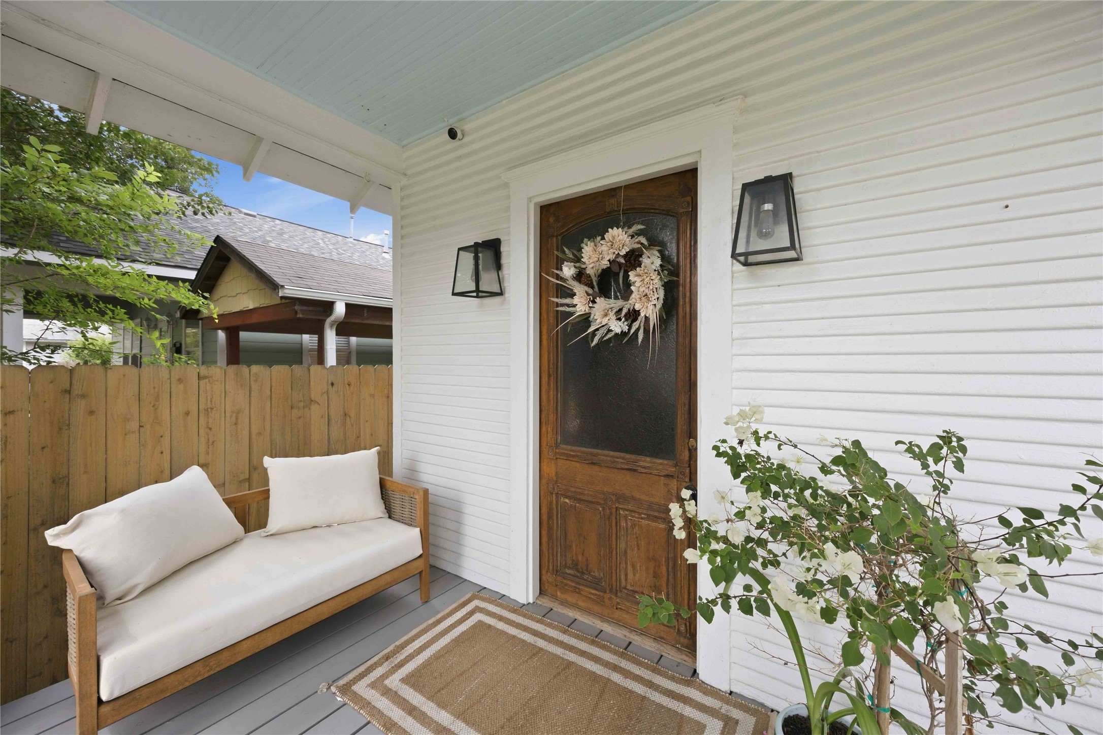 Enjoy porch life in Brooke Smith! Fully fenced with a remote driveway gate.