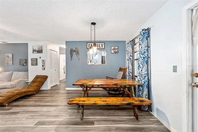 a room with furniture and wooden floor