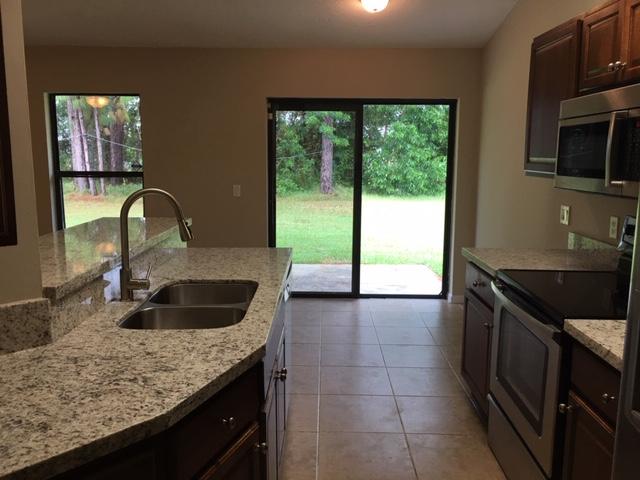 549 Southwest Cherryhill Road Port St. Lucie, FL 34953 - Photo 9 of 17 IMG_6624