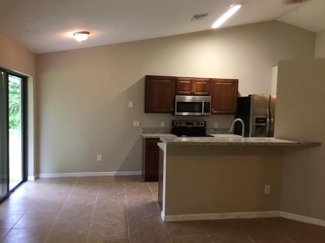 549 Southwest Cherryhill Road Port St. Lucie, FL 34953 - Photo 10 of 17 IMG_6636