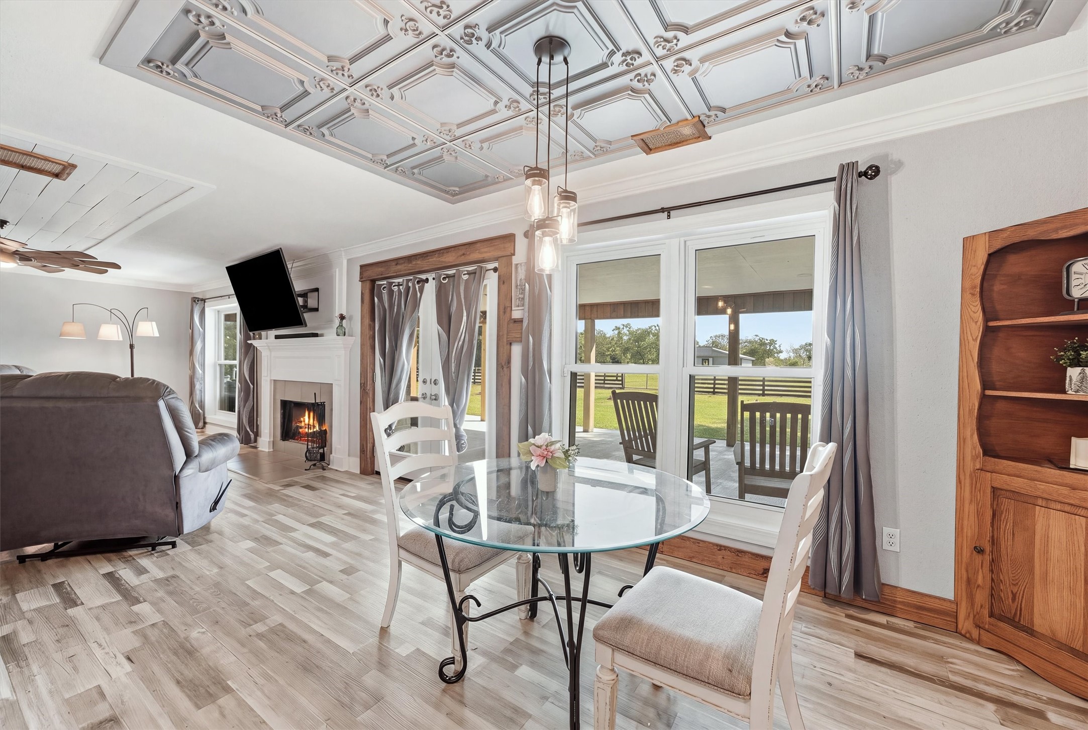 3814 Poskey Road Anahuac, TX 77514 - Photo 12 of 38 Breakfast area with custom ceiling accents