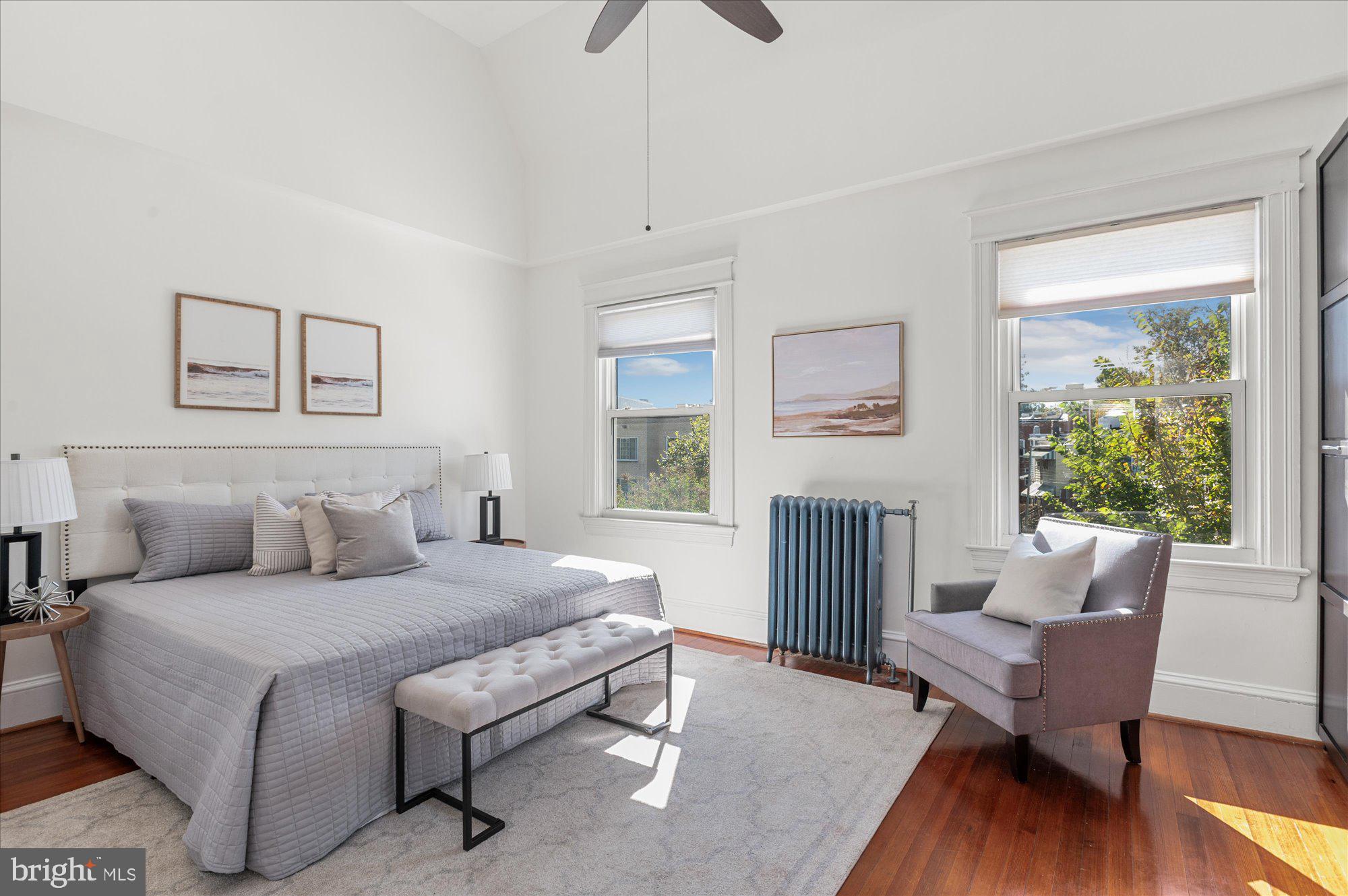 1309 Spring Road Northwest Washington, DC 20010 - Photo 10 of 22 a living room with furniture and a wooden floor