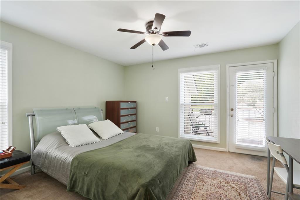3210 Lake Pointe Circle Roswell, GA 30075 - Photo 15 of 26 a bedroom with a bed and a window