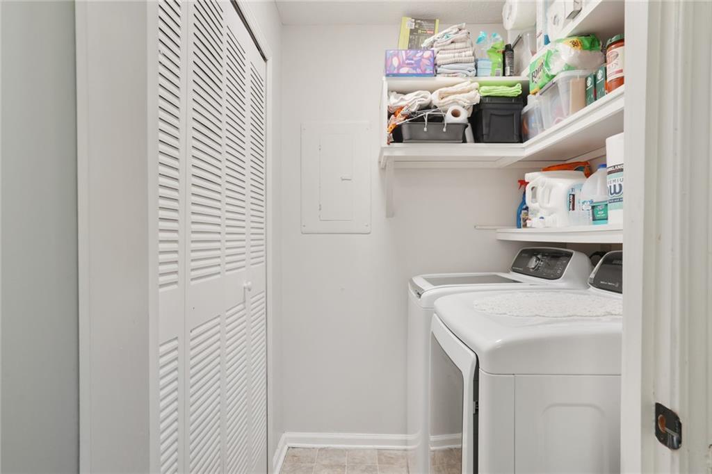 3210 Lake Pointe Circle Roswell, GA 30075 - Photo 21 of 26 a utility room with dryer and washer
