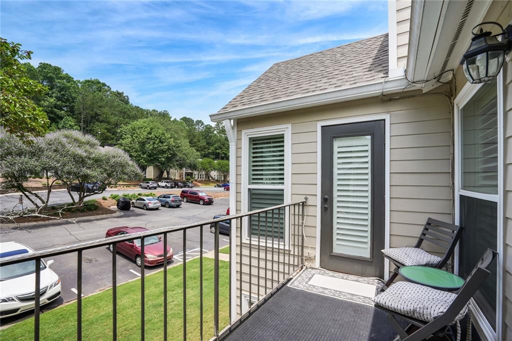 3210 Lake Pointe Circle Roswell, GA 30075 - Photo 22 of 26 a view of a porch with wooden fence