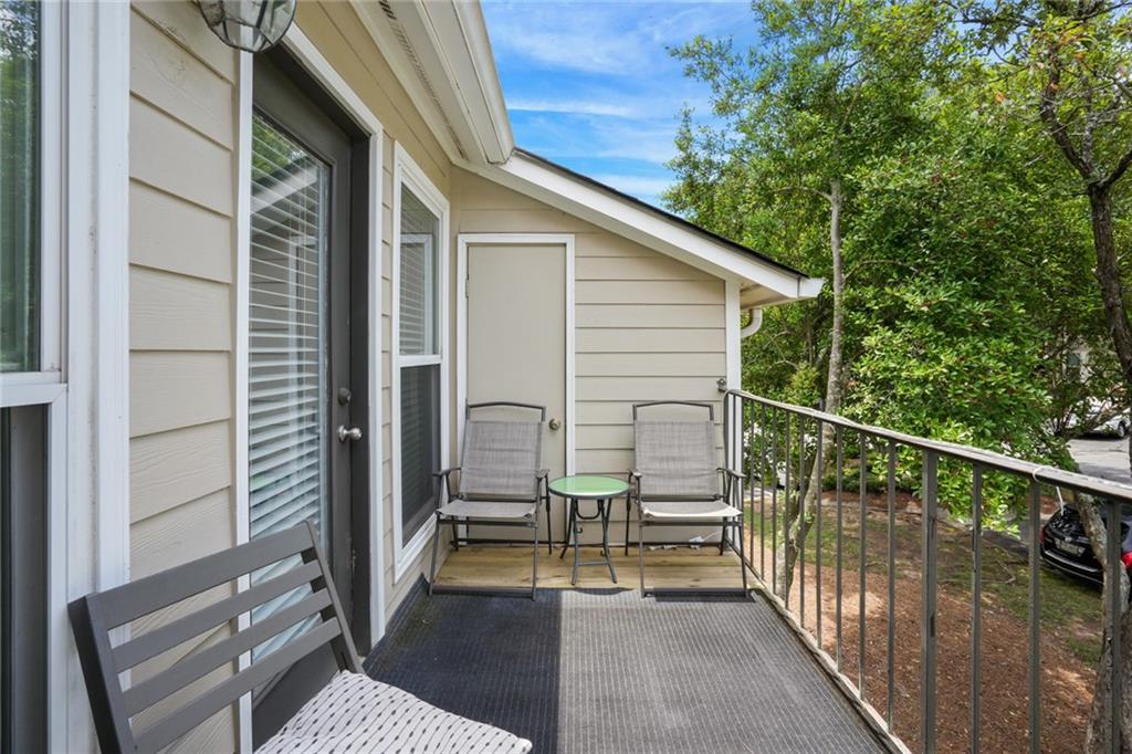 3210 Lake Pointe Circle Roswell, GA 30075 - Photo 23 of 26 a view of a balcony with chairs
