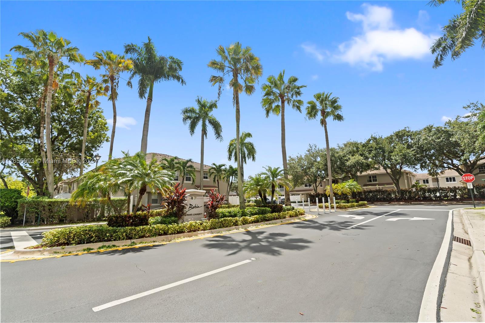 5301 Southwest 126th Terrace, Unit 5301 Miramar, FL 33027 - Photo 2 of 37 a view of a street with a building in the background