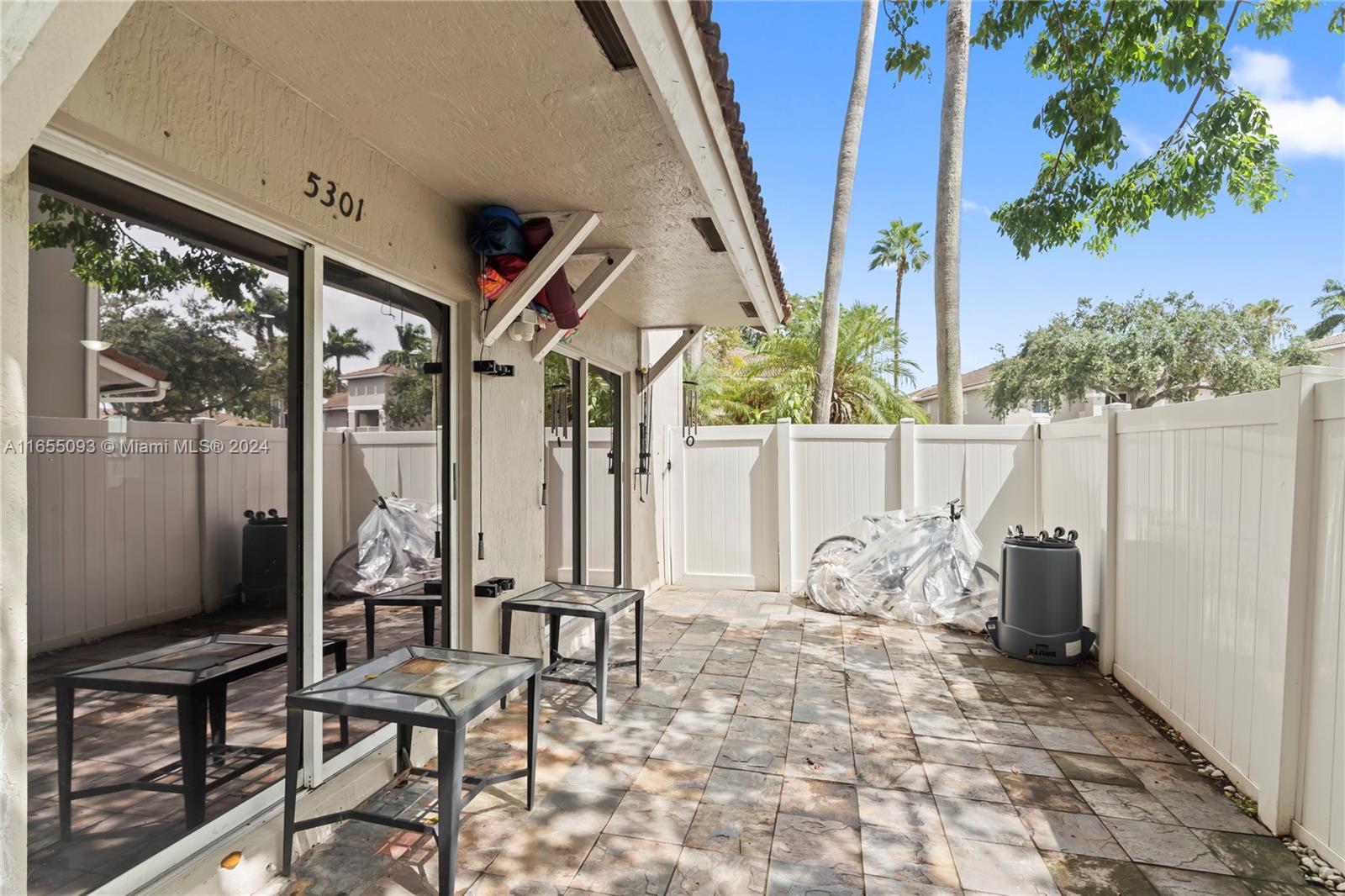 5301 Southwest 126th Terrace, Unit 5301 Miramar, FL 33027 - Photo 33 of 37 a view of porch with seating space
